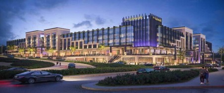 Large hospitality complex illuminated in the evening